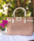 Bolsa Feminina Rosé com Detalhes Off-White – Elegância e Delicadeza