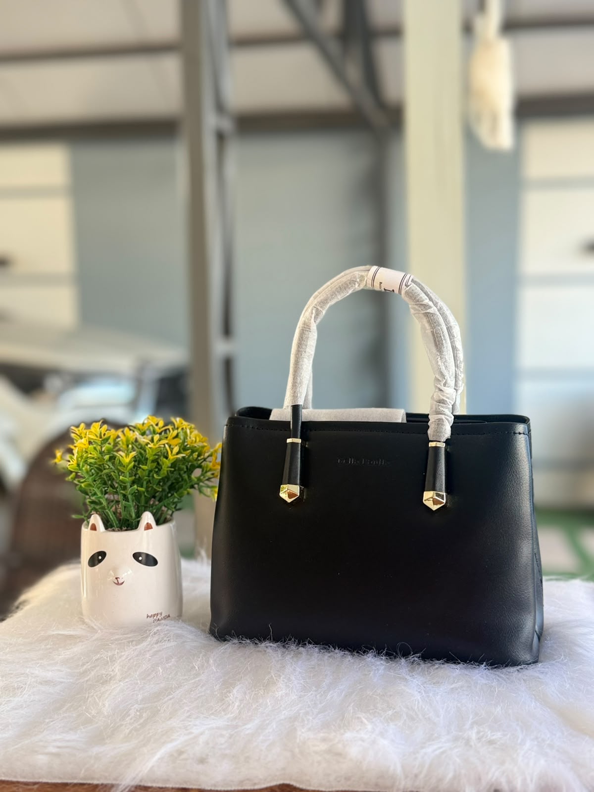 Bolsa de mão estruturada preta